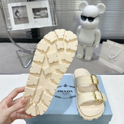 PRADA 25S STRAP SLIDES 30MM IN CREAM CALFSKIN GOLD HARDWARE