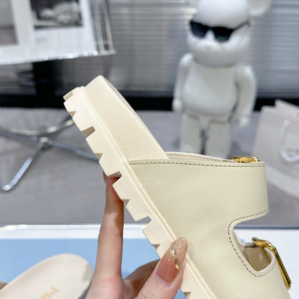 PRADA 25S STRAP SLIDES 30MM IN CREAM CALFSKIN GOLD HARDWARE