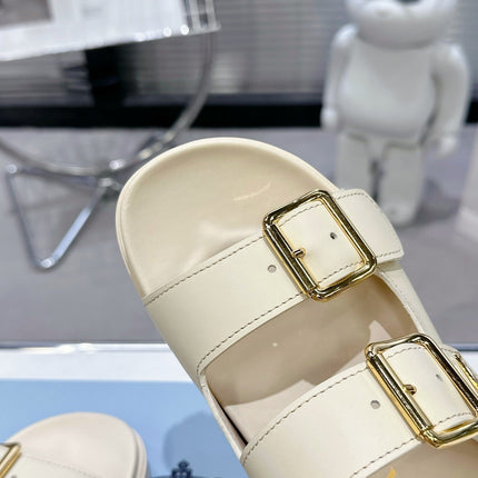 PRADA 25S STRAP SLIDES 30MM IN CREAM CALFSKIN GOLD HARDWARE