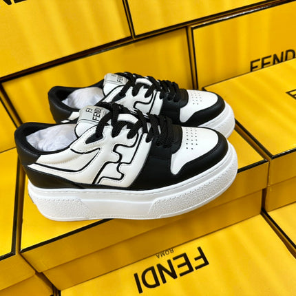 FENDI THICK-SOLDED SNEAKER IN WHITE AND BLACK LAMBSKIN