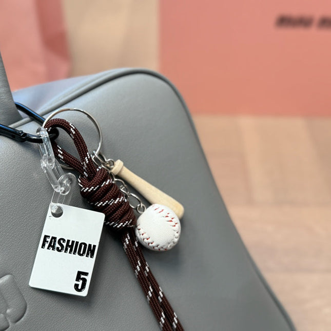 BEAU BAG 33 IN GRAY CALFSKIN WITH BASEBALL CHARM