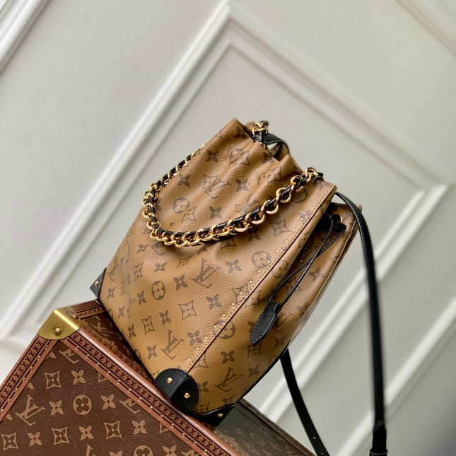 NOÉ TRUNK 23 IN BROWN MONOGRAM REVERSE CANVAS GOLD HARDWARE