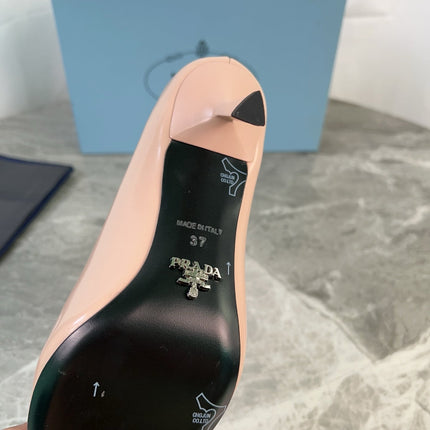 PRADA 25S METAL-CAPPED POINTED-TOE HIGH HEELS IN WARM BEIGE CALFSKIN