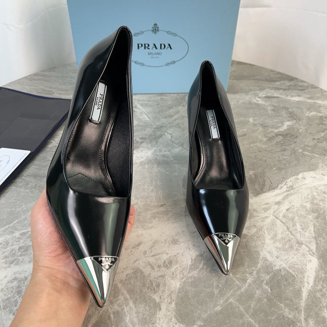 PRADA 25S METAL-CAPPED POINTED-TOE HIGH HEELS IN BLACK CALFSKIN