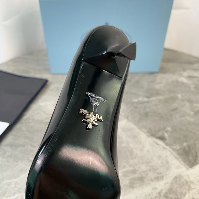 PRADA 25S METAL-CAPPED POINTED-TOE HIGH HEELS IN BLACK CALFSKIN