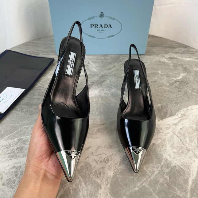 PRADA 25S METAL-TOE SLINGBACK PUMPS IN BLACK CALFSKIN