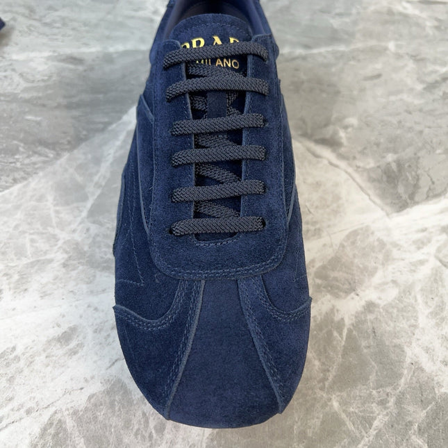 PRADA 25S MONTECARLO ANTIQUED SNEAKERS IN NAVY BLUE SUEDE