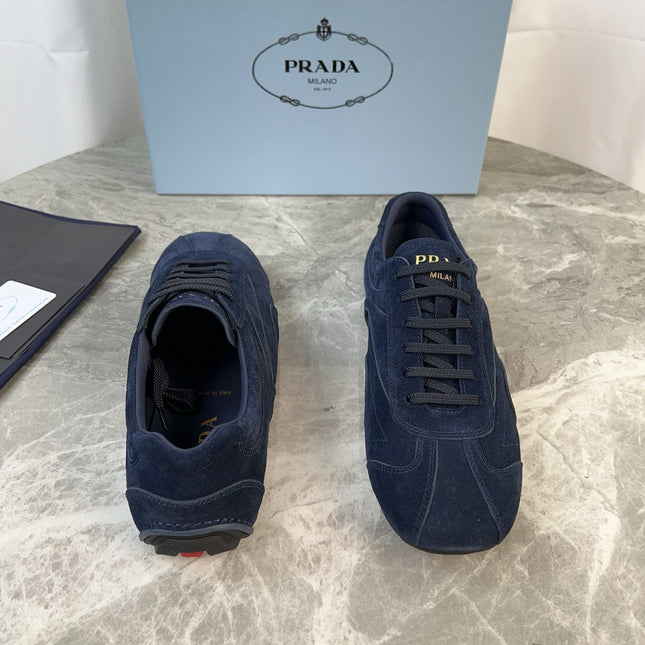 PRADA 25S MONTECARLO ANTIQUED SNEAKERS IN NAVY BLUE SUEDE