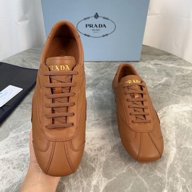 PRADA 25S MONTECARLO ANTIQUED SNEAKERS IN CARAMEL NAPPA LEATHER