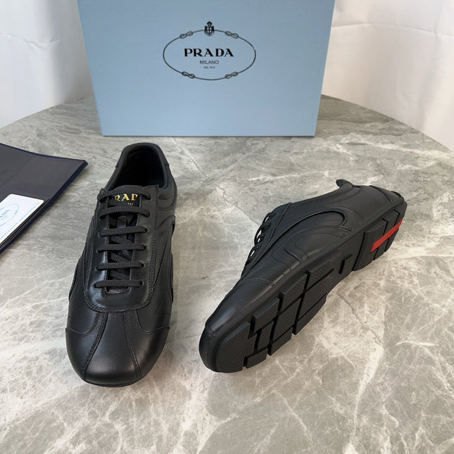 PRADA 25S MONTECARLO ANTIQUED SNEAKERS IN BLACK NAPPA LEATHER