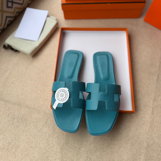 0RAN SANDALS IN SAPPHIRE BLUE CALFSKIN