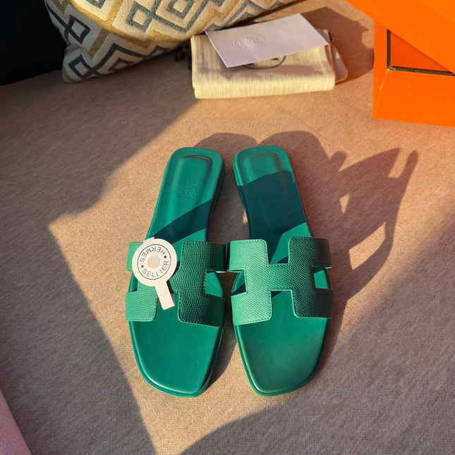 0RAN SANDALS IN PERSIAN GREEN CALFSKIN