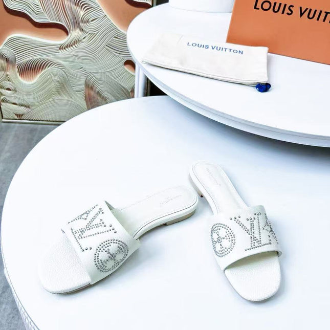 FLAT SLIDE IN WHITE LAMBSKIN WITH RHINSTONES