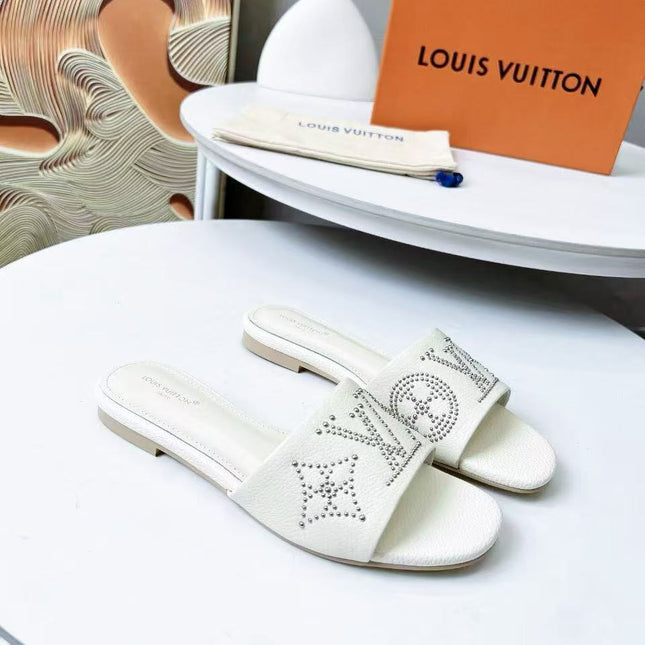 FLAT SLIDE IN WHITE LAMBSKIN WITH RHINSTONES