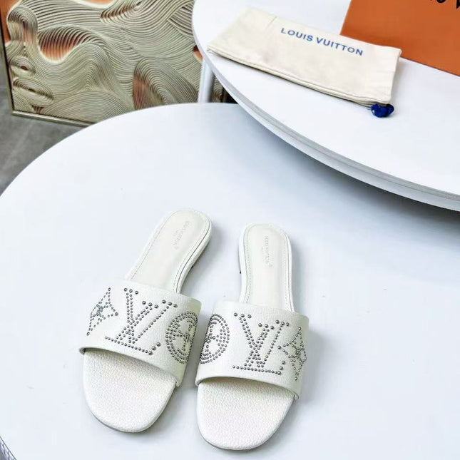 FLAT SLIDE IN WHITE LAMBSKIN WITH RHINSTONES