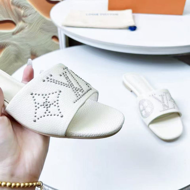 FLAT SLIDE IN WHITE LAMBSKIN WITH RHINSTONES