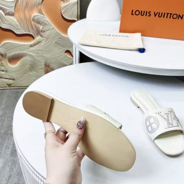 FLAT SLIDE IN WHITE LAMBSKIN WITH RHINSTONES