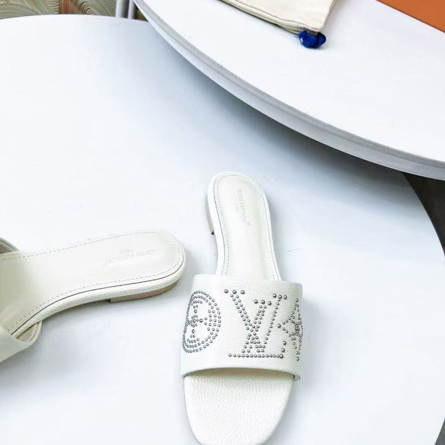 FLAT SLIDE IN WHITE LAMBSKIN WITH RHINSTONES