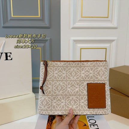 LOE 28 CLUTCH BAG IN BEIGE ANAGRAM JACQUARD