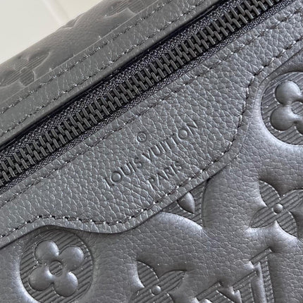 MESSENGER VOYAGER PM 33 IN BLACK MONOGRAM SHADOW CALFSKIN
