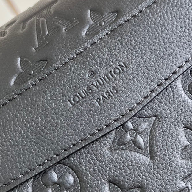 MESSENGER VOYAGER PM 33 IN BLACK MONOGRAM SHADOW CALFSKIN