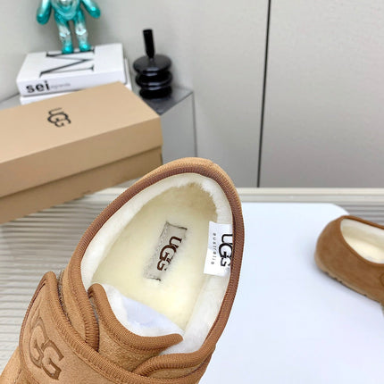 TELFAR SLIPPER IN CIDER BROWN SUEDE AND SHEARLING LINING