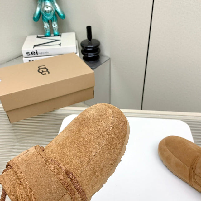 TELFAR SLIPPER IN CIDER BROWN SUEDE AND SHEARLING LINING