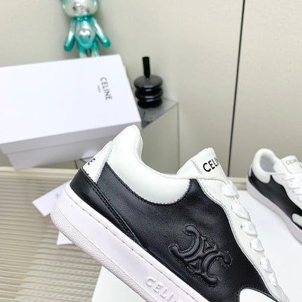 SNEAKER WITH TRIOMPHE IN BLACK AND WHITE CALFSKIN
