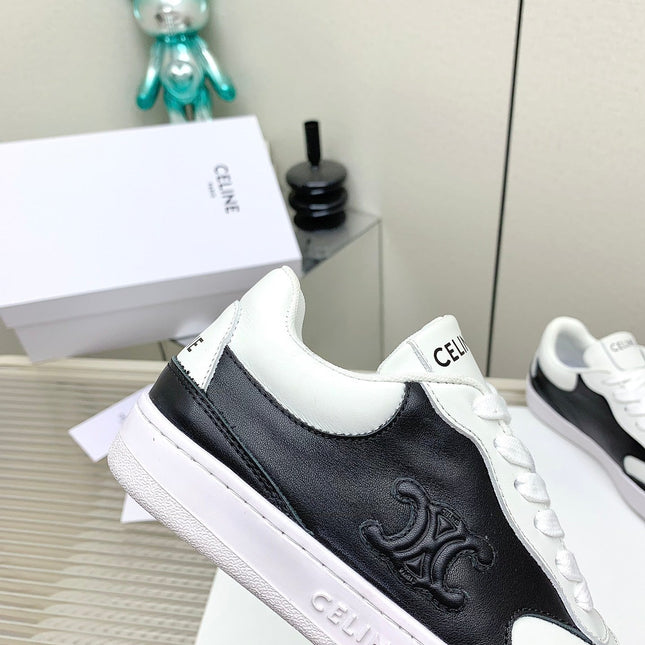 SNEAKER WITH TRIOMPHE IN BLACK AND WHITE CALFSKIN