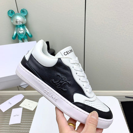 SNEAKER WITH TRIOMPHE IN BLACK AND WHITE CALFSKIN