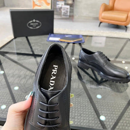 PRA LACE-UP SHOES IN BLACK CALFSKIN
