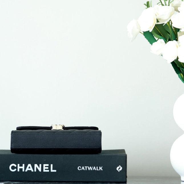 CHANEL 25S KELLY IN BLACK LAMBSKIN WITH GOLD HARDWARE