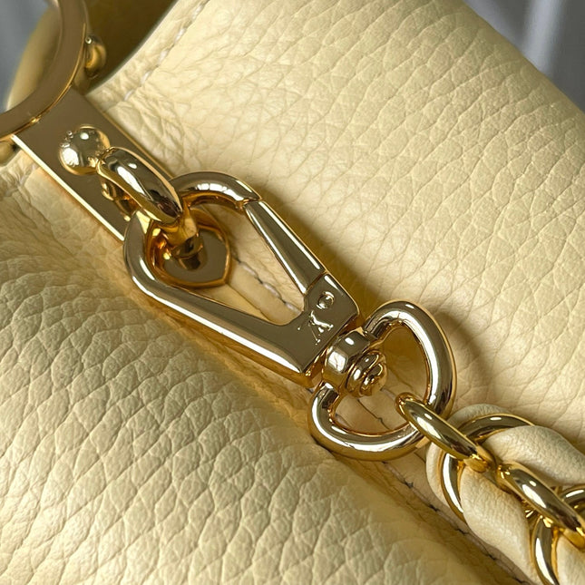 CAPUCINES EAST-WEST MINI 22 IN BANANA YELLOW TAURILLON GOLD HARDWARE