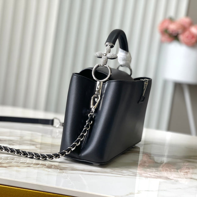 CAPUCINES EAST-WEST 30 IN BLACK SHEEPSKIN CRYSTAL AND SILVER HARDWARE