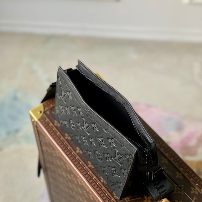 POCHETTE VOYAGE 22 IN BLACK MONOGRAM SHADOW CALFSKIN