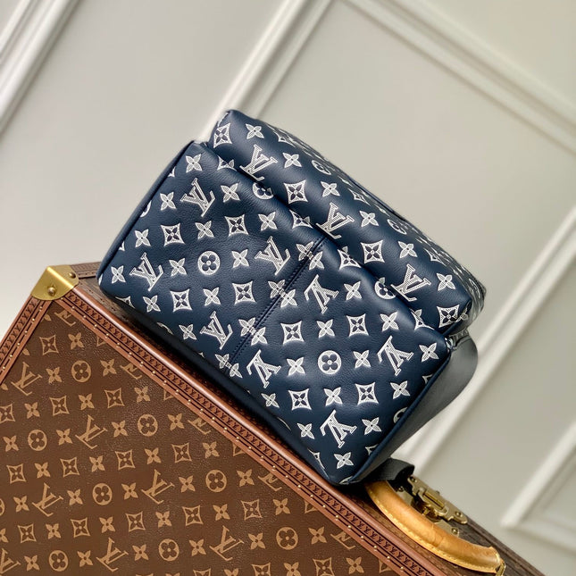 DISCOVERY PM BACKPACK 38 IN NAVY BLUE LAMBSKIN WHITE MONOGRAM LOGO