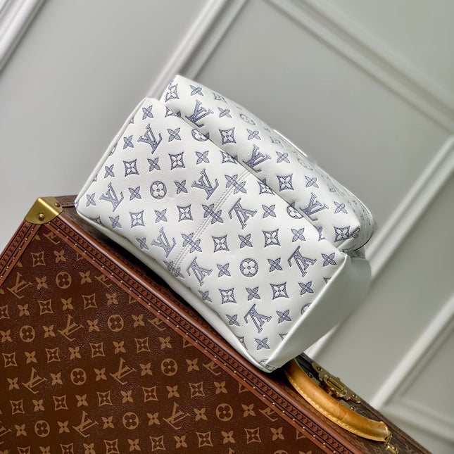 DISCOVERY PM BACKPACK 38 IN WHITE MONOGRAM LAMBSKIN