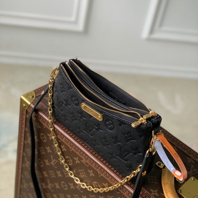 LIV POCHETTE BAG 24 IN BLACK MONOGRAM EMPREINTE LEATHER