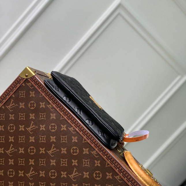 LIV POCHETTE BAG 24 IN BLACK MONOGRAM EMPREINTE LEATHER