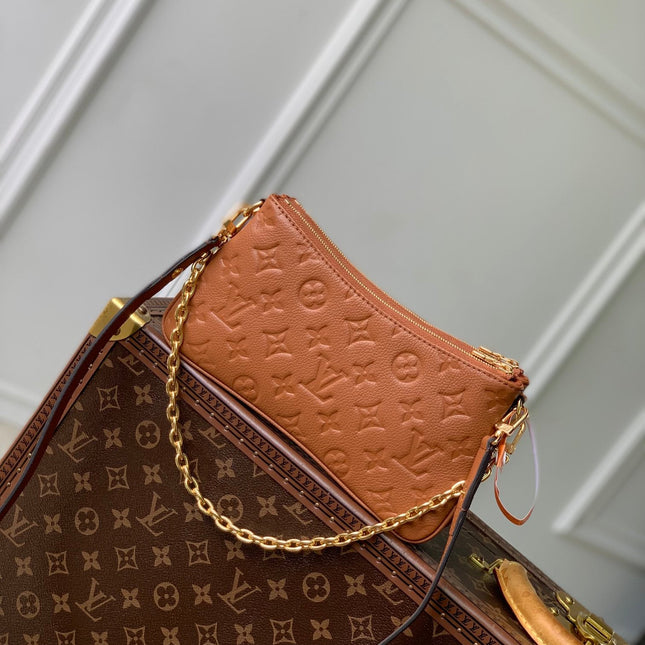 LIV POCHETTE BAG 24 IN COGNAC BROWN MONOGRAM EMPREINTE LEATHER