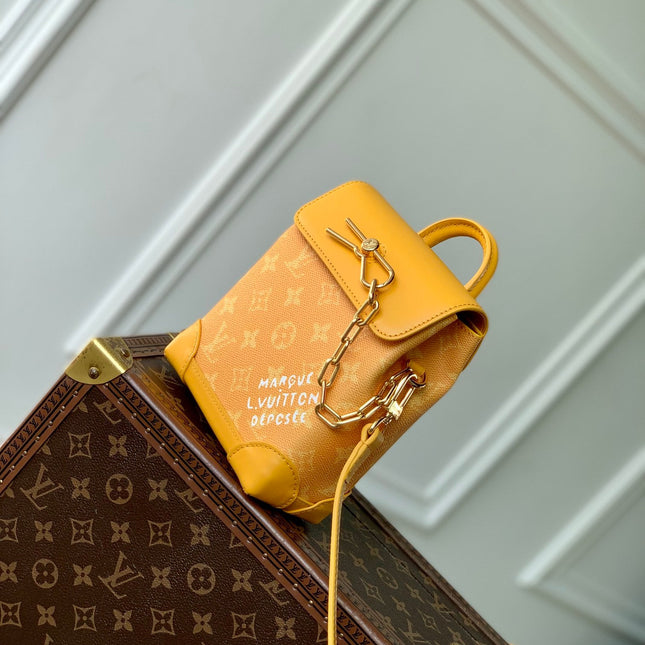 STEAMER 18 IN PEPPER ORANGE MONOGRAM HERITAGE CANVAS GOLD HARDWARE