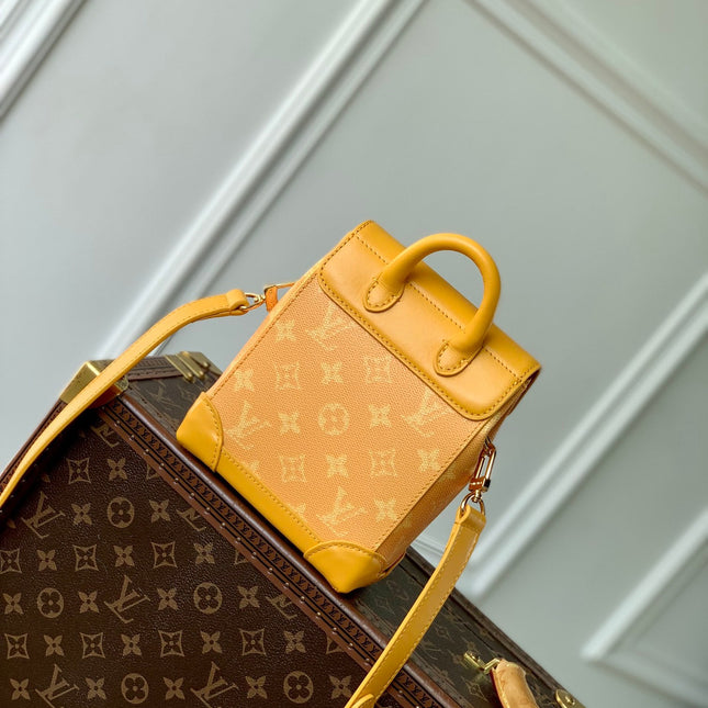 STEAMER 18 IN PEPPER ORANGE MONOGRAM HERITAGE CANVAS GOLD HARDWARE