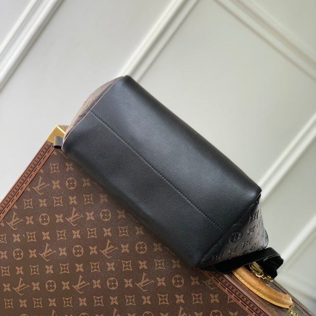 GETAWAY BACKPACK 50 IN BLACK MONOGRAM ECLIPSE CANVAS AND CALFSKIN EMBOSSED LOGO