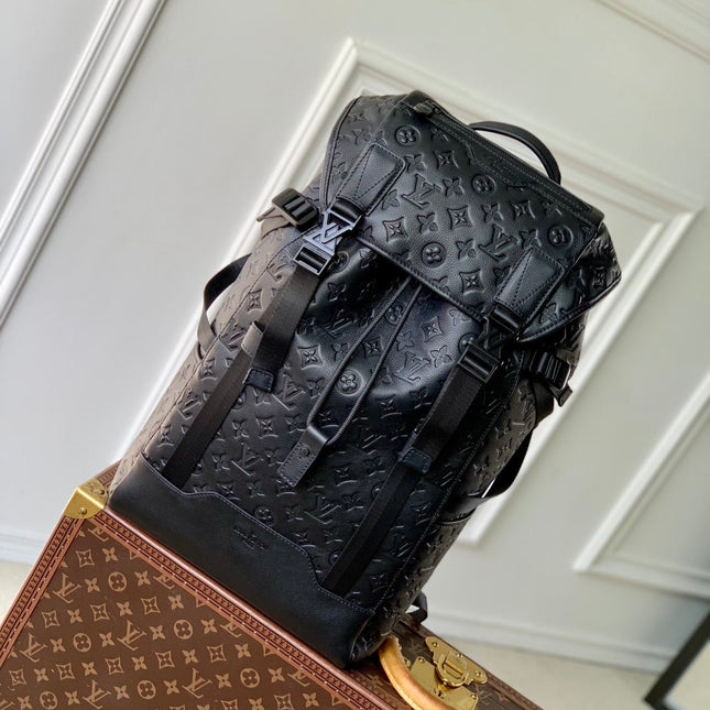 GETAWAY BACKPACK 50 IN BLACK MONOGRAM ECLIPSE CANVAS AND CALFSKIN EMBOSSED LOGO