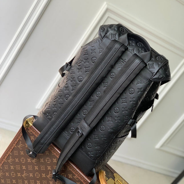 GETAWAY BACKPACK 50 IN BLACK MONOGRAM ECLIPSE CANVAS AND CALFSKIN EMBOSSED LOGO
