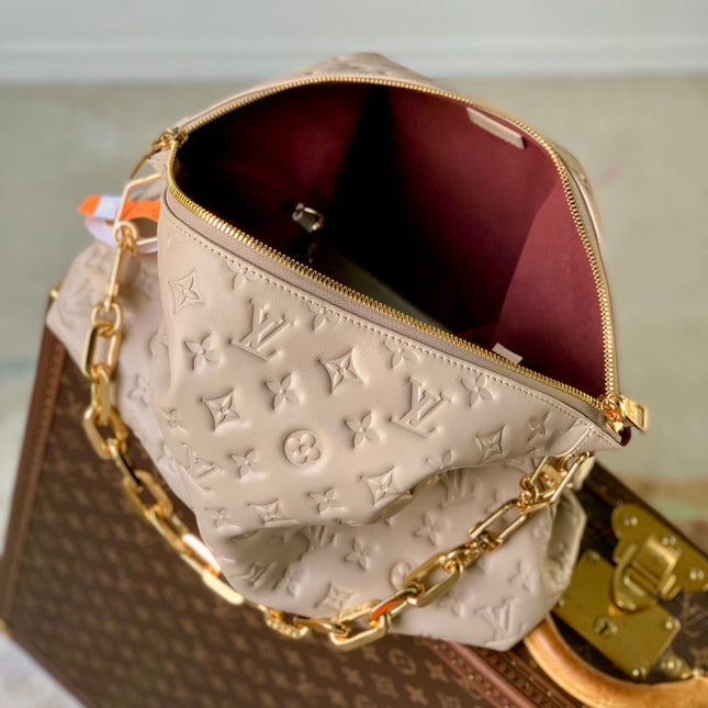 COUSSIN MM 38 IN BEIGE MONOGRAM EMBOSSED CALFSKIN GOLD HARDWARE