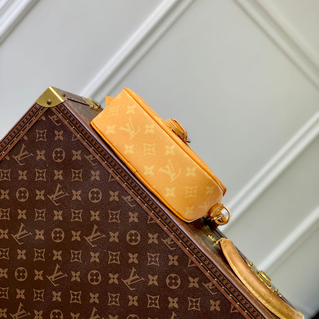 MONTSOURIS MESSENGER PM 20 IN PEPPER ORANGE MONOGRAM HERITAGE CANVAS