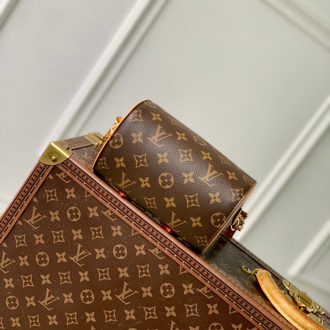 NANO SPEEDY DATING 18 IN BROWN COATED CANVAS GOLD HARDWARE