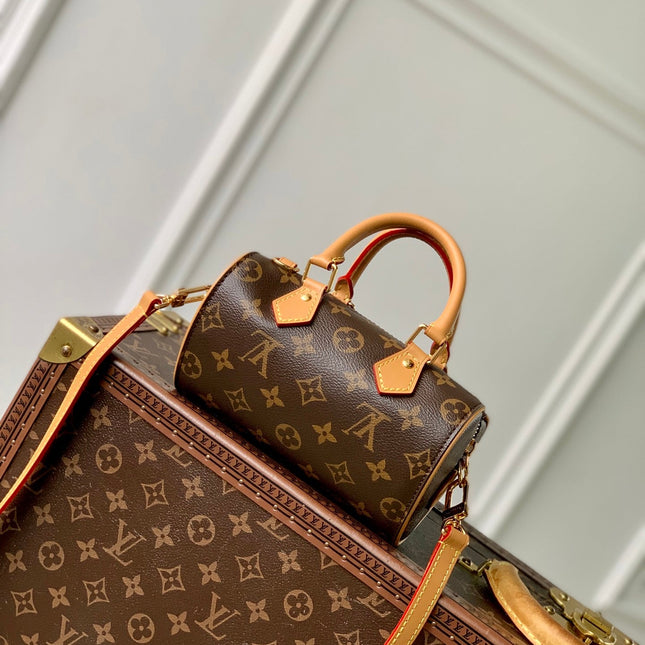 NANO SPEEDY DATING 18 IN BROWN COATED CANVAS GOLD HARDWARE