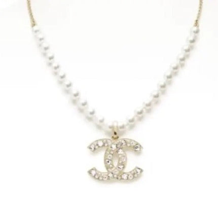 25P PEARL NECKLACE IN LIGHT GOLD STAR & HEART DOUBLE C PENDANT